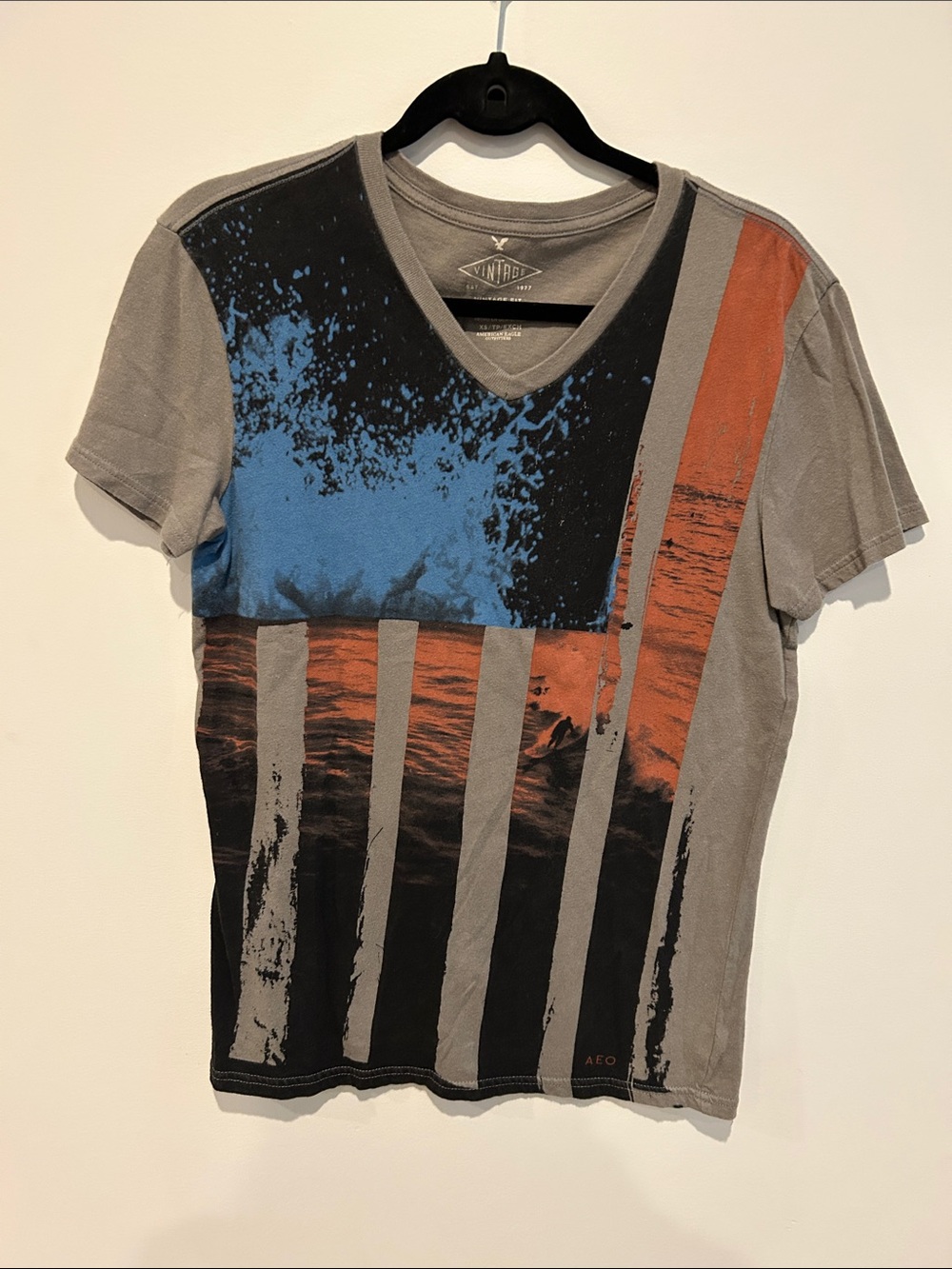 American Eagle Outfitters Gray V-Neck Graphic Tee with Blue and Orange Accents
